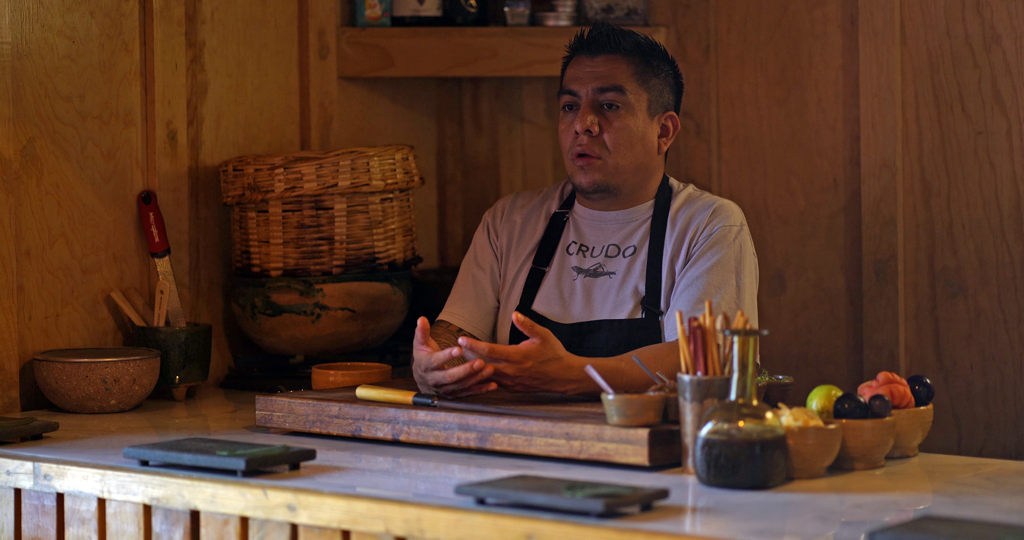 A male chef explains the menu