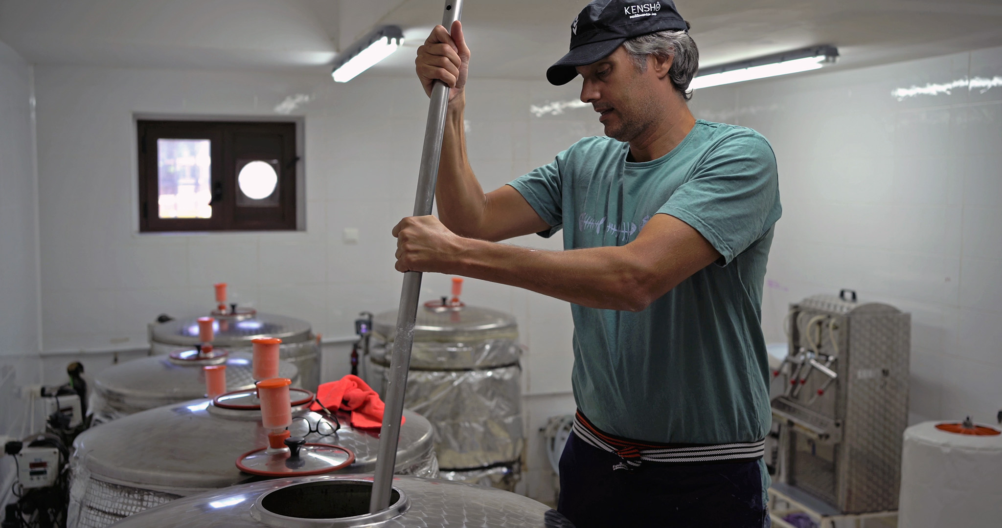 Man working at a sake brewery