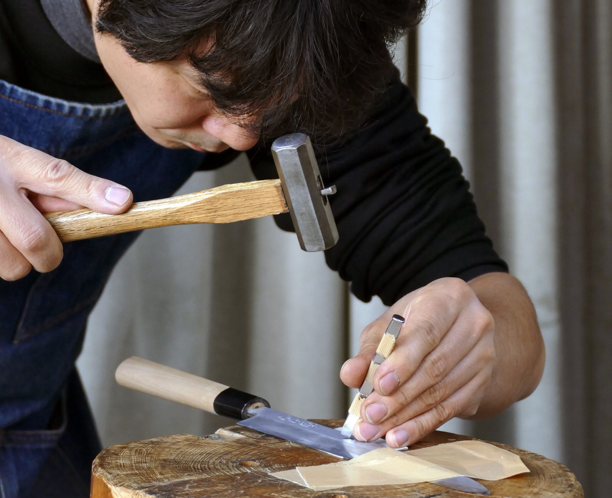 Japanese knife maker at work